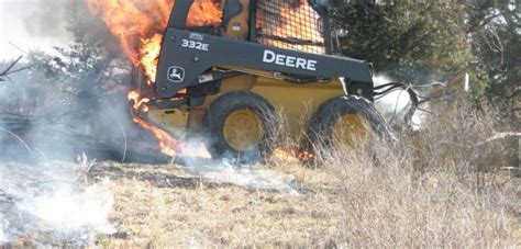 flaming skid steer|burned skid steer.